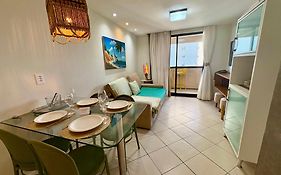 Apartamento em hotel com vista para o mar